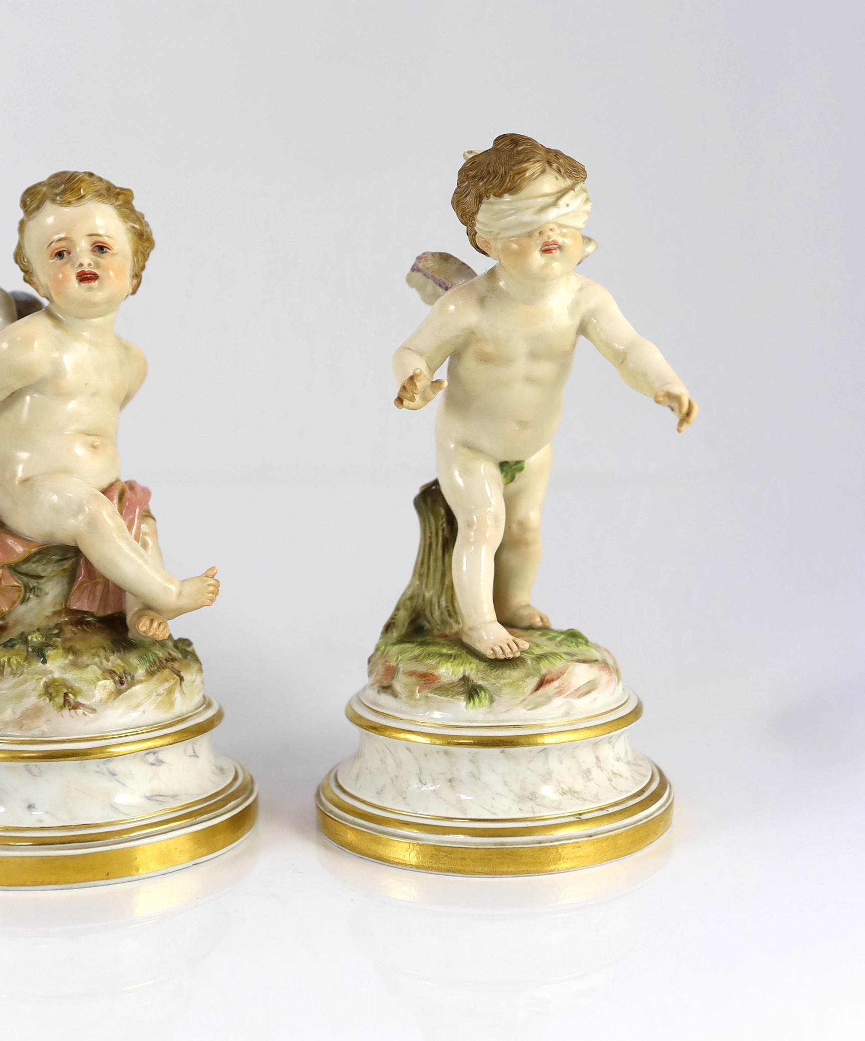 A series of five Meissen porcelain figures of Cupid, late 19th century, modelled by Heinrich Schwabe, 15.5cm - 20cm high, perplexed Cupid restored, Provenance - purchased from Winifred Williams, Eastbourne/London before